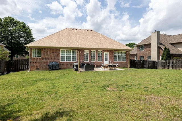2184 Loudenslager Dr, Thompsons Station, TN 37179 - rear view of property featuring a patio, brick siding, and crawl space