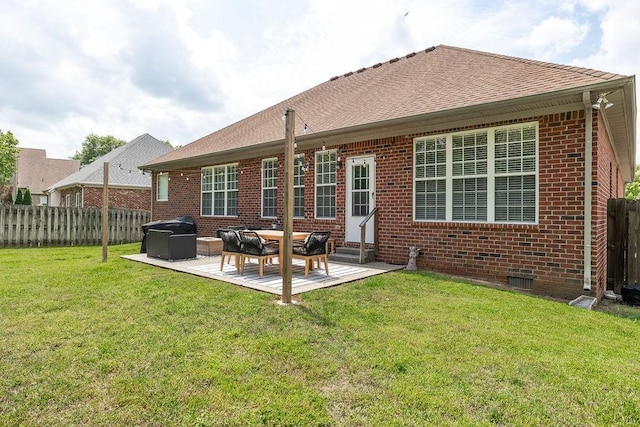 2184 Loudenslager Dr, Thompsons Station, TN 37179 - rear view of property with brick siding, entry steps, a patio area, and roof with shingles