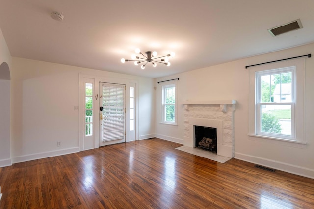 2219 Blair Blvd, Nashville, TN 37212 - unfurnished living room with plenty of natural light, a fireplace with flush hearth, and wood finished floors