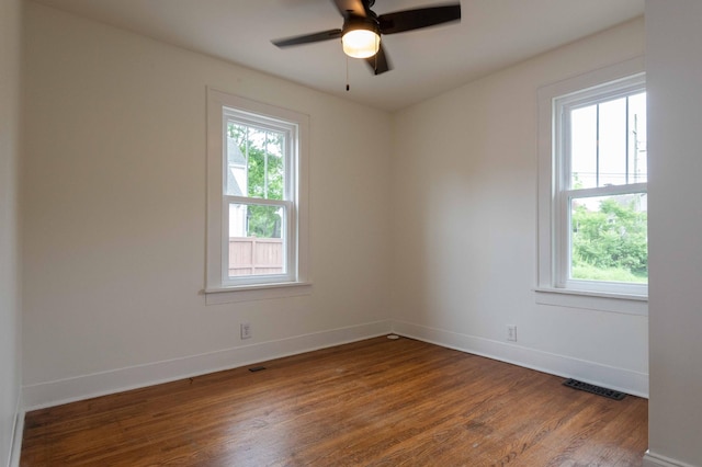 2219 Blair Blvd, Nashville, TN 37212 - unfurnished room with healthy amount of natural light, wood finished floors, and baseboards