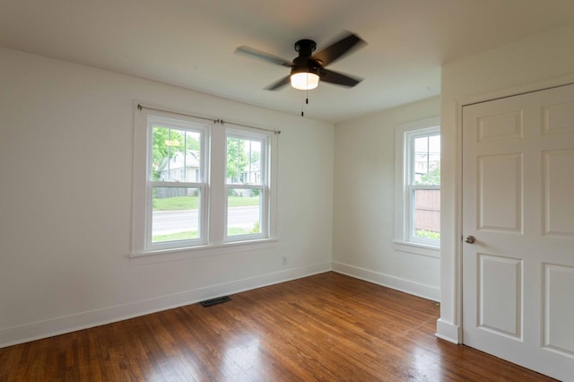 2219 Blair Blvd, Nashville, TN 37212 - spare room with healthy amount of natural light, dark wood-style flooring, baseboards, and ceiling fan