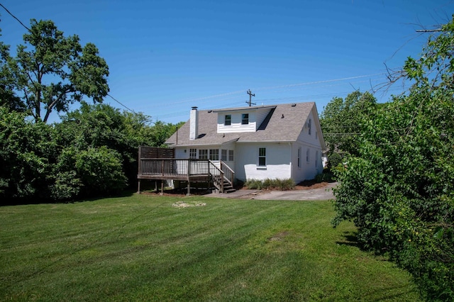 2219 Blair Blvd, Nashville, TN 37212 - rear view of house featuring a wooden deck, a lawn, and a chimney