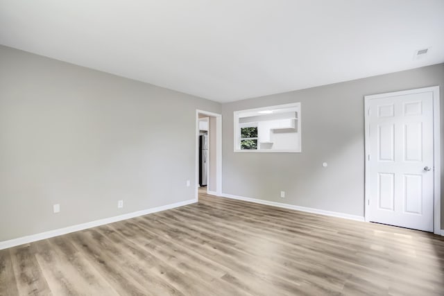 1454 Elm Hill Dr, Clarksville, TN 37040 - spare room with baseboards and light wood-style flooring