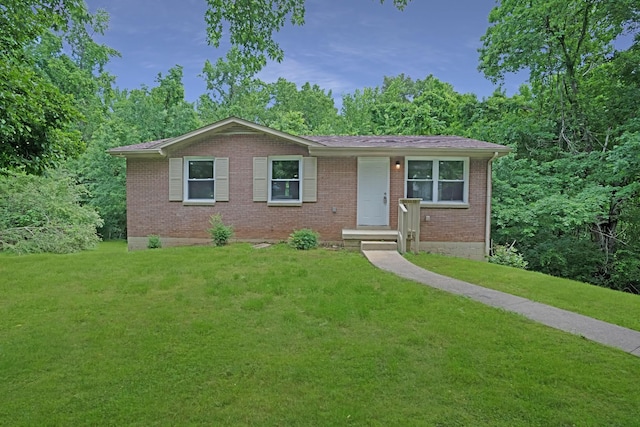 1454 Elm Hill Dr, Clarksville, TN 37040 - ranch-style house featuring brick siding and a front lawn