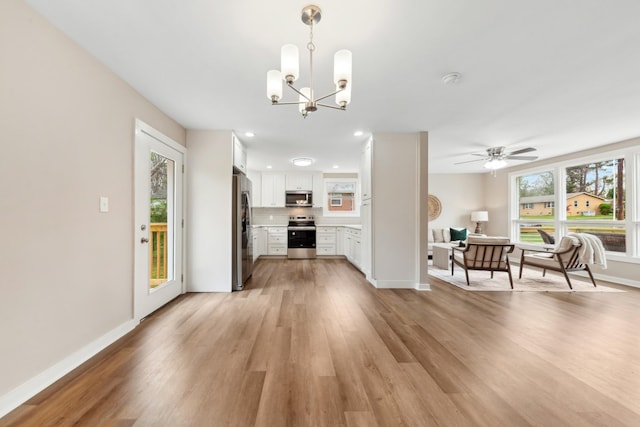 1614 Shady Cir, Lebanon, TN 37087 - dining area with light wood-type flooring, baseboards, a chandelier, a ceiling fan, and recessed lighting