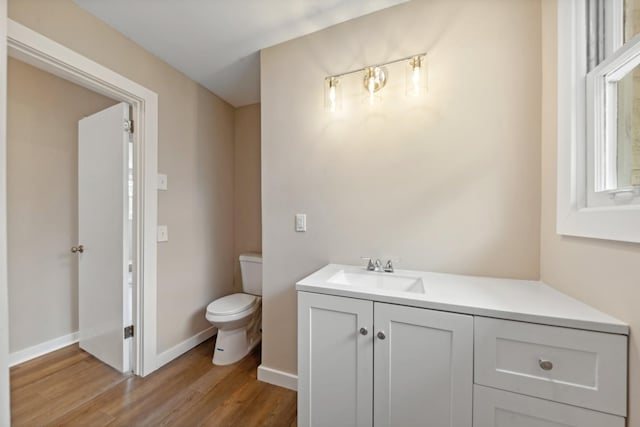 1614 Shady Cir, Lebanon, TN 37087 - half bathroom with toilet, wood finished floors, vanity, and baseboards