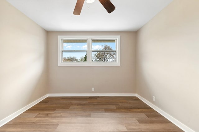 1614 Shady Cir, Lebanon, TN 37087 - spare room featuring plenty of natural light, a ceiling fan, and wood finished floors