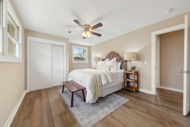1614 Shady Cir, Lebanon, TN 37087 - bedroom with wood finished floors, multiple windows, baseboards, and ceiling fan