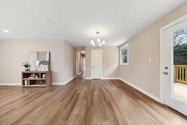 1614 Shady Cir, Lebanon, TN 37087 - unfurnished dining area featuring a chandelier, light wood-style floors, and baseboards
