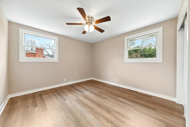 1614 Shady Cir, Lebanon, TN 37087 - unfurnished room featuring plenty of natural light, light wood-style flooring, and baseboards