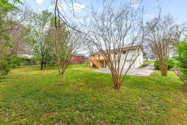 1614 Shady Cir, Lebanon, TN 37087 - view of green lawn featuring stairway and a wooden deck