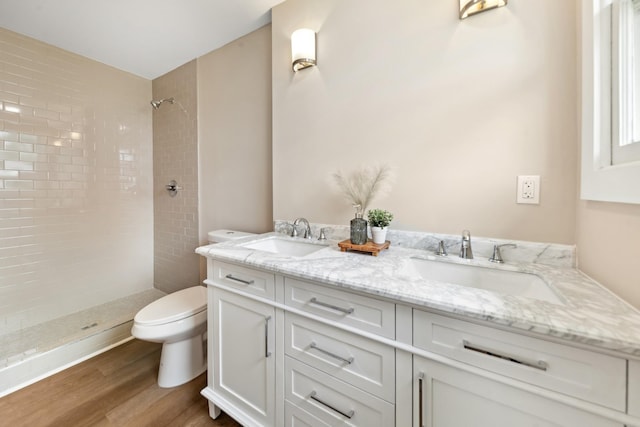 1614 Shady Cir, Lebanon, TN 37087 - full bath featuring toilet, a tile shower, wood finished floors, and double vanity