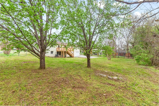 1614 Shady Cir, Lebanon, TN 37087 - view of yard with stairway, a wooden deck, and a garage
