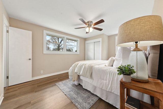 1614 Shady Cir, Lebanon, TN 37087 - bedroom featuring baseboards, wood finished floors, a closet, and ceiling fan