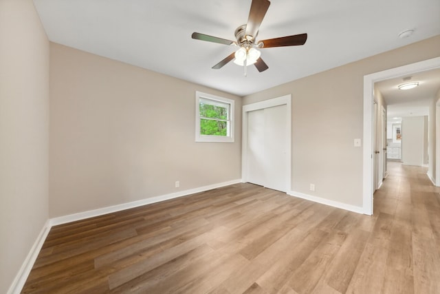 1614 Shady Cir, Lebanon, TN 37087 - unfurnished bedroom featuring light wood finished floors, baseboards, a closet, and ceiling fan