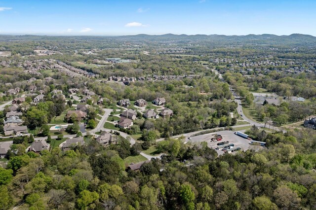 1515 Owen Rd, Brentwood, TN 37027 - aerial overview of property's location featuring a mountainous background and a forest