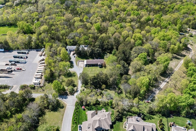 1515 Owen Rd, Brentwood, TN 37027 - aerial view of property and surrounding area featuring a heavily wooded area