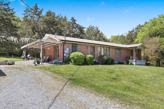 1515 Owen Rd, Brentwood, TN 37027 - ranch-style home with brick siding, a front yard, and driveway