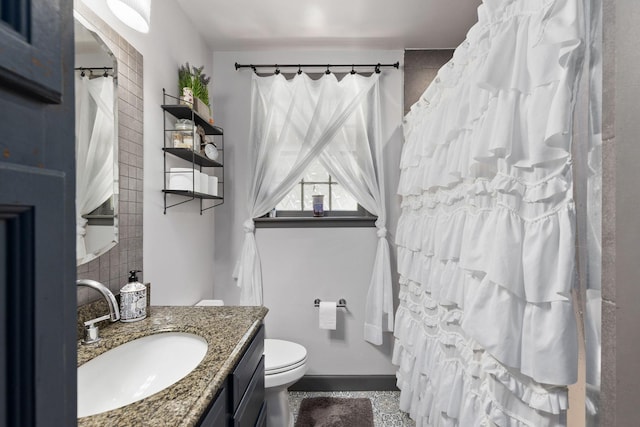 1515 Owen Rd, Brentwood, TN 37027 - bathroom featuring toilet, vanity, baseboards, and a shower with curtain