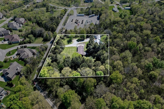 1515 Owen Rd, Brentwood, TN 37027 - aerial perspective of suburban area with property boundaries highlighted and a forest