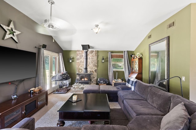 1515 Owen Rd, Brentwood, TN 37027 - living area with lofted ceiling, a wood stove, healthy amount of natural light, carpet flooring, and ceiling fan