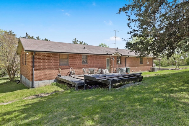 1515 Owen Rd, Brentwood, TN 37027 - back of property featuring a lawn, central air condition unit, and brick siding