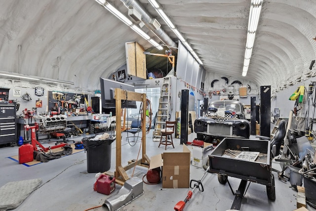 1515 Owen Rd, Brentwood, TN 37027 - miscellaneous room featuring lofted ceiling, a workshop area, and concrete flooring