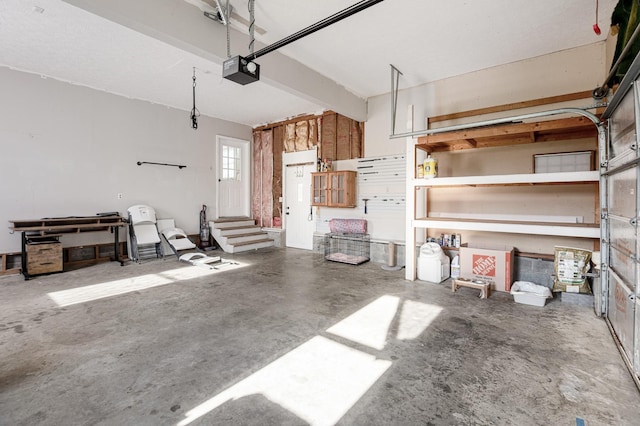garage featuring a garage door opener