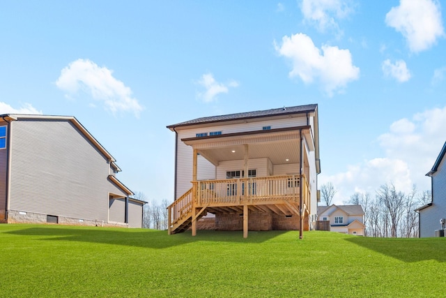 back of house featuring a deck, a lawn, crawl space, and stairs