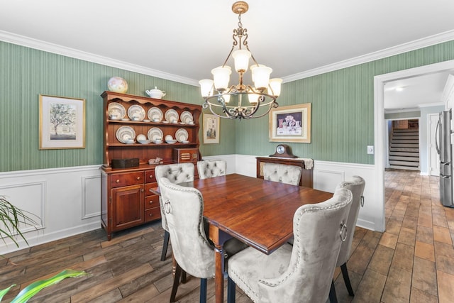 707 Bradford Pl, Murfreesboro, TN 37130 - dining room featuring stairway, dark wood-type flooring, a chandelier, crown molding, and a wainscoted wall