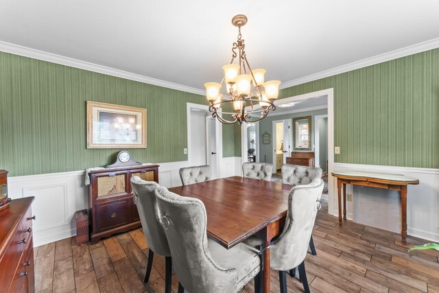 707 Bradford Pl, Murfreesboro, TN 37130 - dining room featuring a chandelier, dark wood-style floors, a wainscoted wall, crown molding, and wallpapered walls