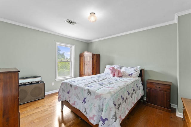 707 Bradford Pl, Murfreesboro, TN 37130 - bedroom with hardwood / wood-style floors, ornamental molding, and baseboards
