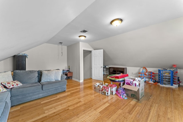 707 Bradford Pl, Murfreesboro, TN 37130 - game room with wood finished floors, vaulted ceiling, and baseboards