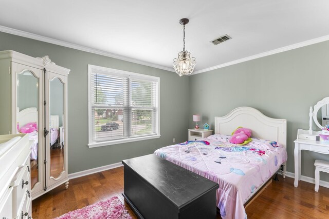 707 Bradford Pl, Murfreesboro, TN 37130 - bedroom featuring ornamental molding, wood finished floors, baseboards, and a chandelier