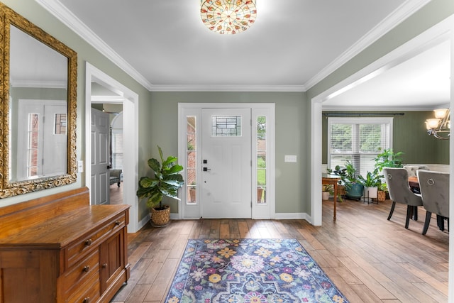 707 Bradford Pl, Murfreesboro, TN 37130 - entryway with light wood-type flooring, a chandelier, baseboards, and ornamental molding