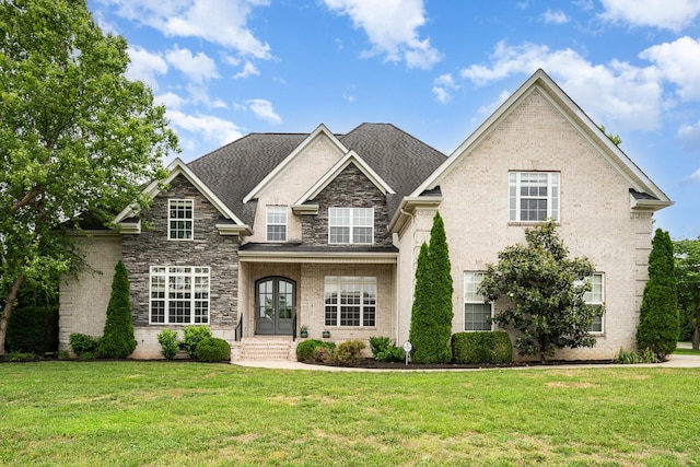 2804 Battleground Dr, Murfreesboro, TN 37129 - view of front facade with french doors, a front yard, and stone siding
