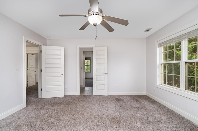 2804 Battleground Dr, Murfreesboro, TN 37129 - unfurnished bedroom featuring carpet, baseboards, and a ceiling fan