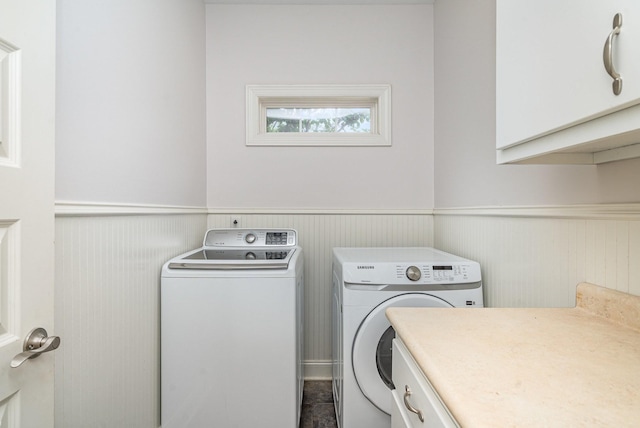 2804 Battleground Dr, Murfreesboro, TN 37129 - laundry area featuring washer and clothes dryer, a wainscoted wall, and cabinet space