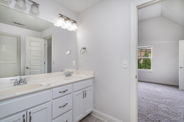 2804 Battleground Dr, Murfreesboro, TN 37129 - full bathroom with baseboards, lofted ceiling, and double vanity