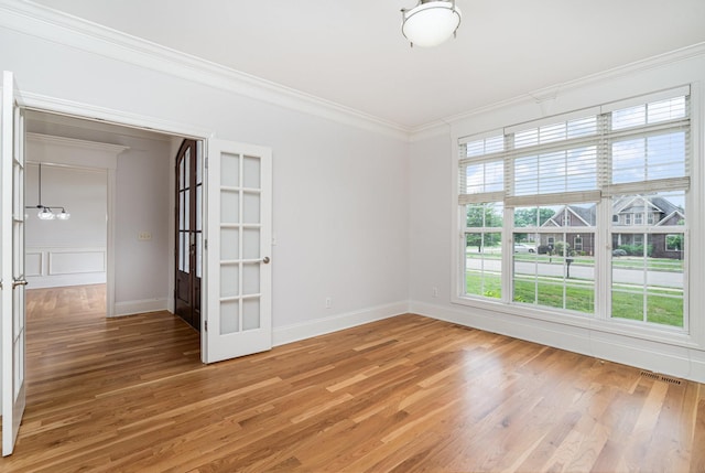2804 Battleground Dr, Murfreesboro, TN 37129 - unfurnished room featuring crown molding, light wood-style flooring, and baseboards