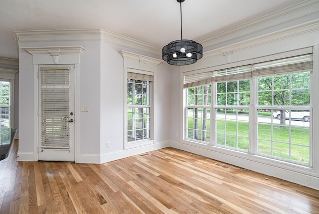2804 Battleground Dr, Murfreesboro, TN 37129 - unfurnished dining area with baseboards, a chandelier, light wood finished floors, and crown molding