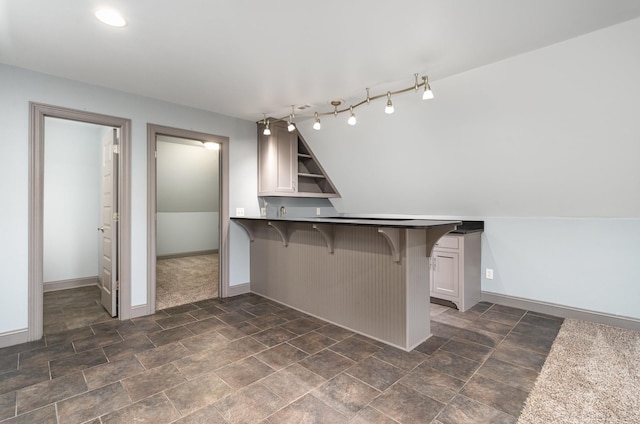 2804 Battleground Dr, Murfreesboro, TN 37129 - kitchen with a kitchen breakfast bar, a peninsula, open shelves, baseboards, and recessed lighting