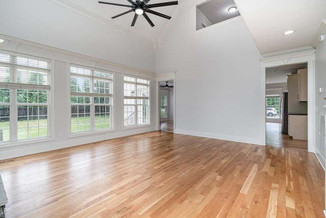 2804 Battleground Dr, Murfreesboro, TN 37129 - unfurnished room with ceiling fan, ornamental molding, light wood finished floors, high vaulted ceiling, and baseboards