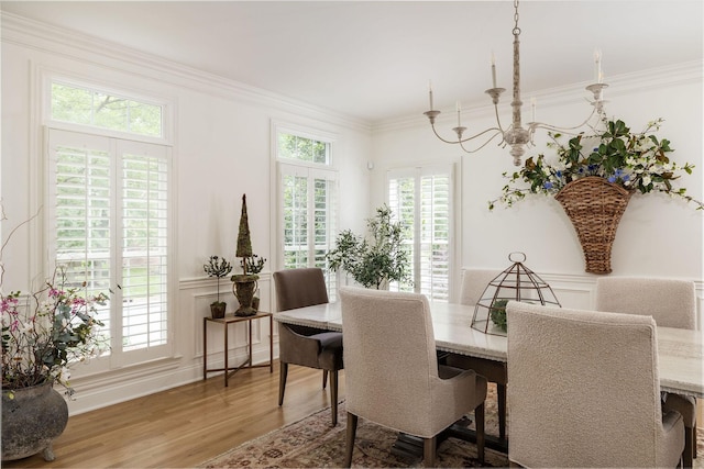 635 Band Dr, Franklin, TN 37064 - dining area with wood finished floors, ornamental molding, and a chandelier