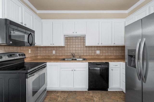 kitchen with black appliances, a sink, crown molding, white cabinetry, and tasteful backsplash