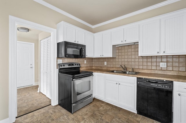 kitchen featuring black appliances, a sink, crown molding, white cabinetry, and tasteful backsplash
