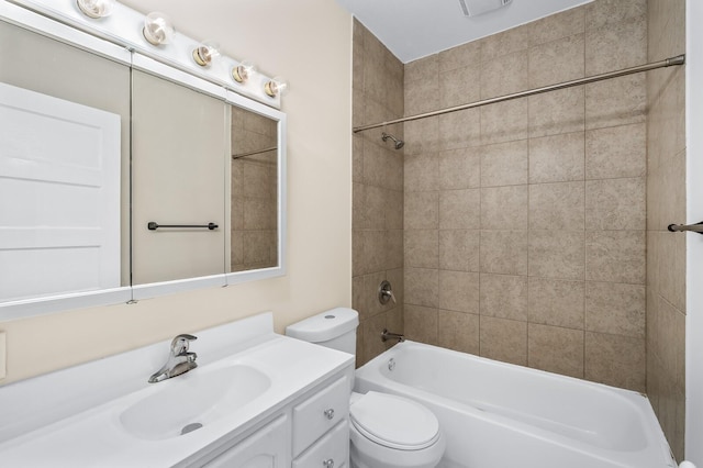 bathroom with toilet, vanity, and bathtub / shower combination