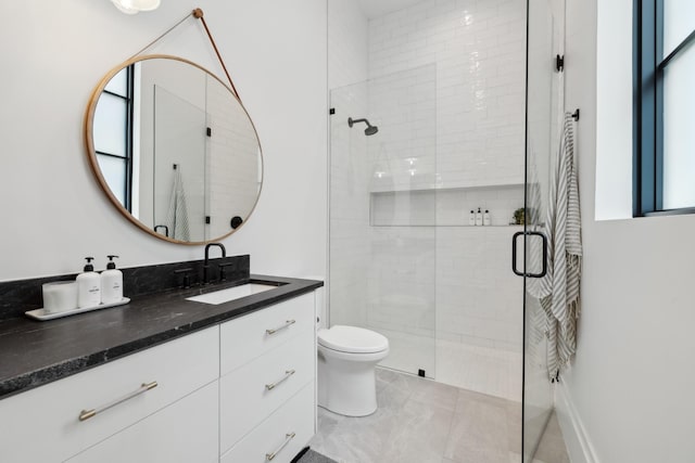 9052 Passiflora Ct, College Grove, TN 37046 - bathroom featuring a stall shower, vanity, and toilet