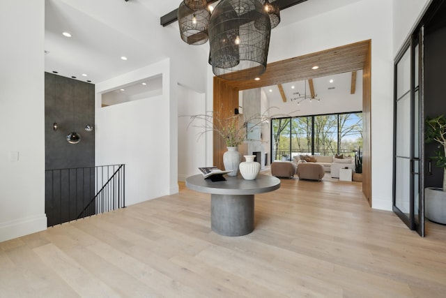 9052 Passiflora Ct, College Grove, TN 37046 - hall featuring a towering ceiling, recessed lighting, an upstairs landing, wood finished floors, and baseboards