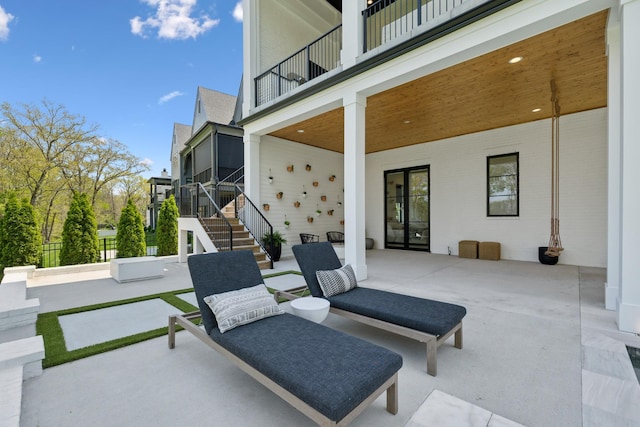 9052 Passiflora Ct, College Grove, TN 37046 - view of patio / terrace featuring stairs, a balcony, and fence